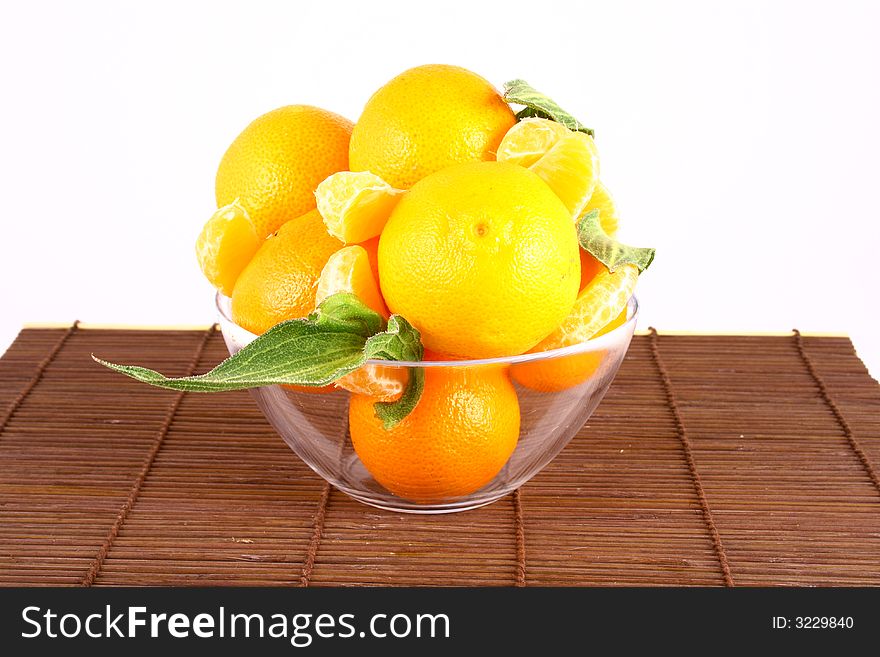 Fresh tangerine and orange isolated on white background