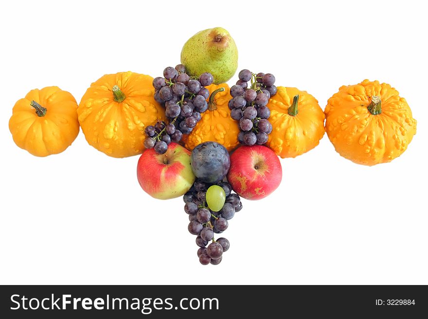 Fruit and vegetable on white