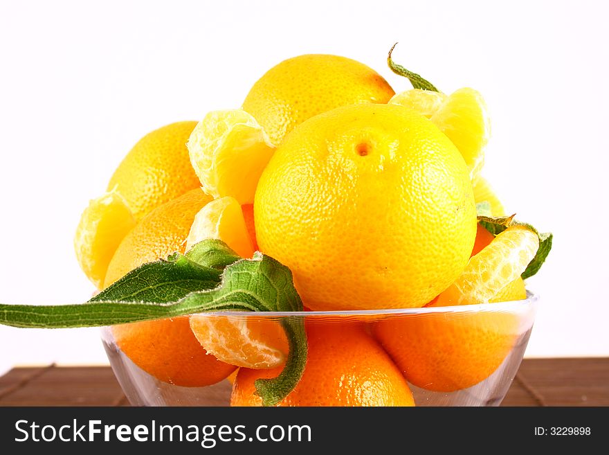 Fresh tangerine and orange isolated on white background