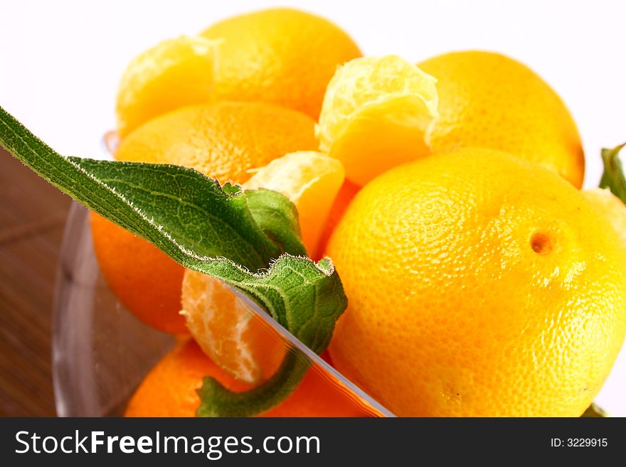 Fresh tangerine and orange isolated on white background