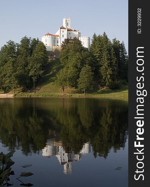 Trakoscan castle on lake with reflection