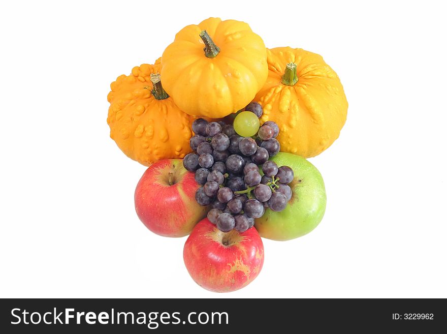 Fruit and vegetable on white