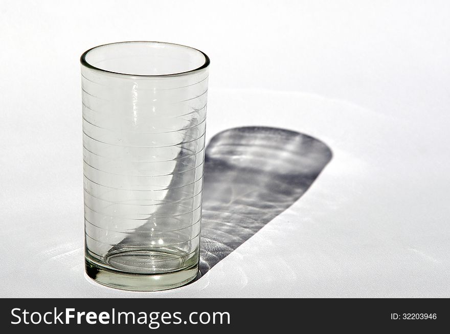 An empty water cup on a white background.