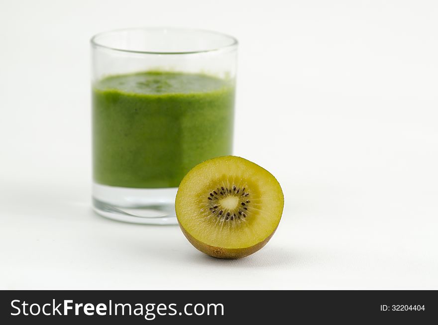 Green smoothie alkaline diet drink with fresh kiwi fruit.