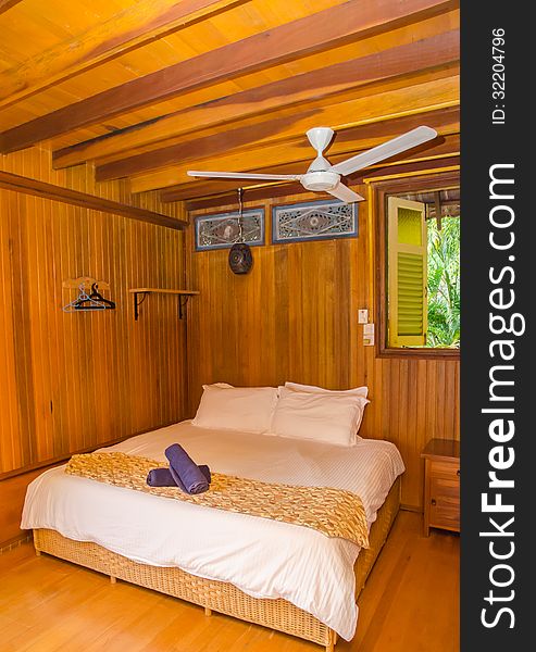 Bed inside a wooden resort. Bed inside a wooden resort