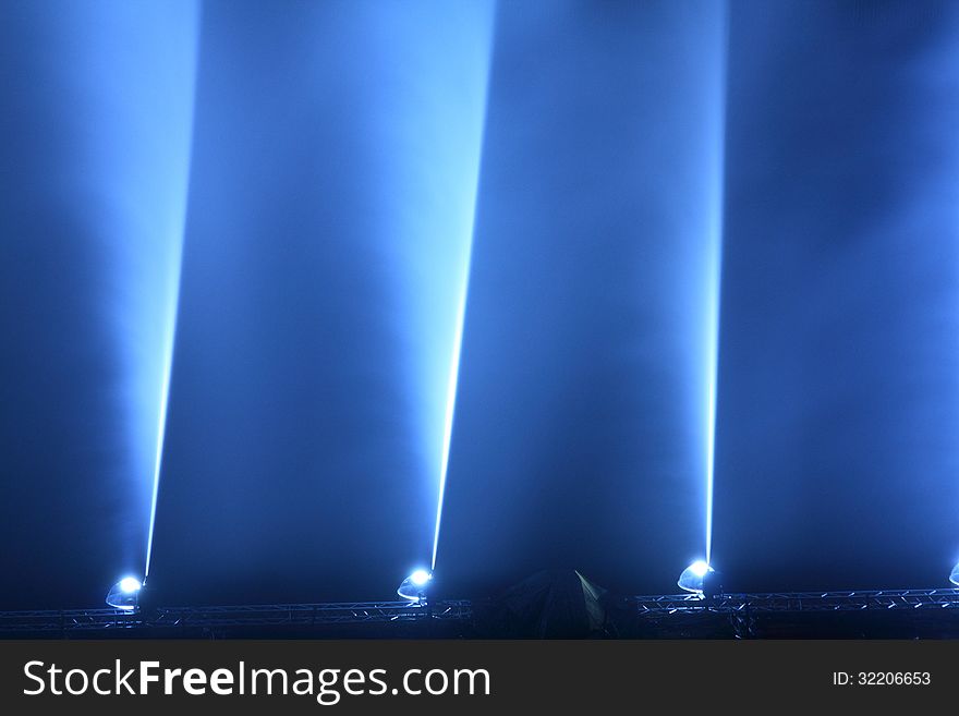 Close up of water fountains blue illuminated. Close up of water fountains blue illuminated.