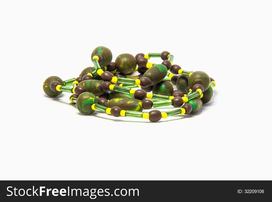 Handmade beads brown, green and yellow color. Handmade beads brown, green and yellow color