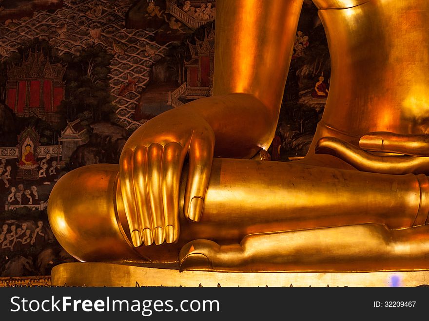 Golden Buddha statue right hands