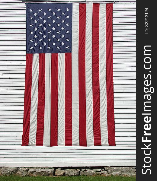 USA flag hanging on the back of church in Biddeford, Maine. USA flag hanging on the back of church in Biddeford, Maine