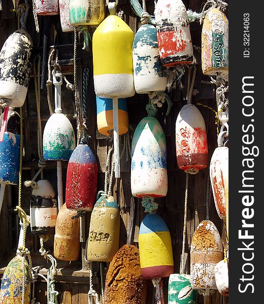 Buoys hanging on the side of bait shop