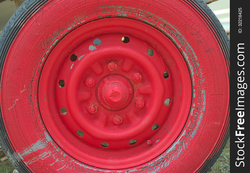 Old red wheel and tire