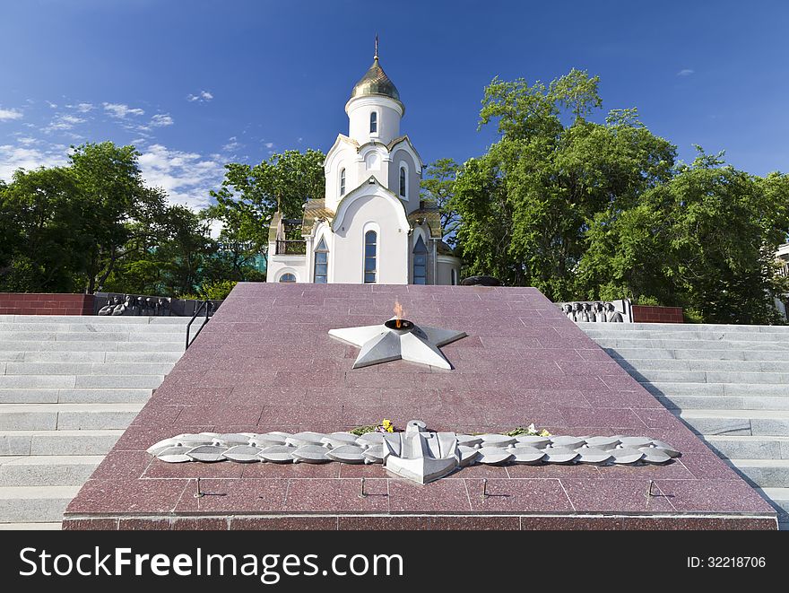 The eternal flame burns on a monument in honor of the lost soldiers