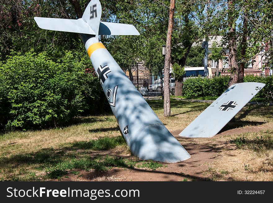 Wreckage of military aircraft.Under the open sky museum exhibit