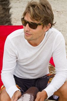 Young Man On Vacation At The Beach Royalty Free Stock Photography Young Man On Vacation At The Beach Royalty Free Stock Photography