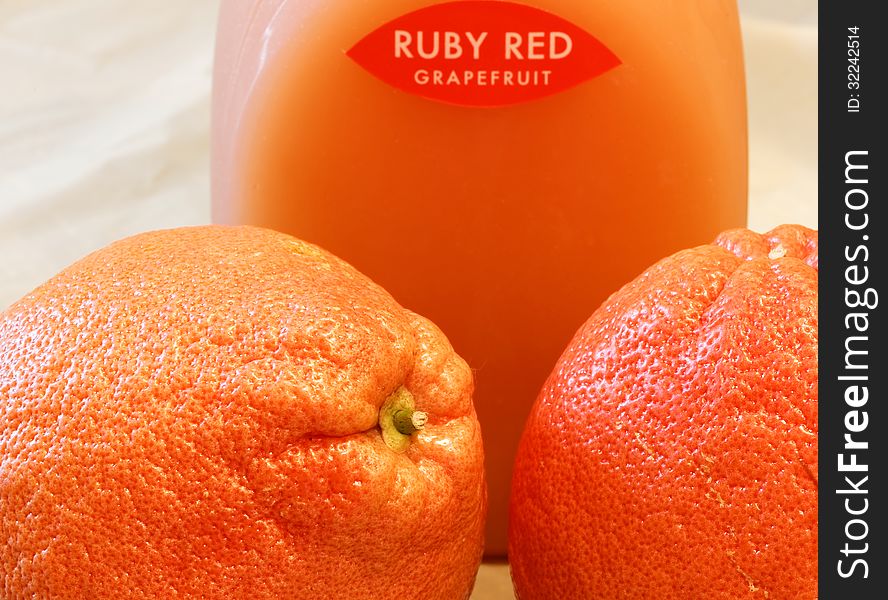 Close up of grapefruits and grapefruit juice