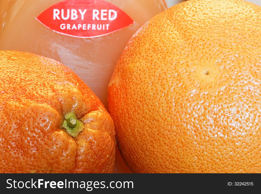 Close up of grapefruits and grapefruit juice