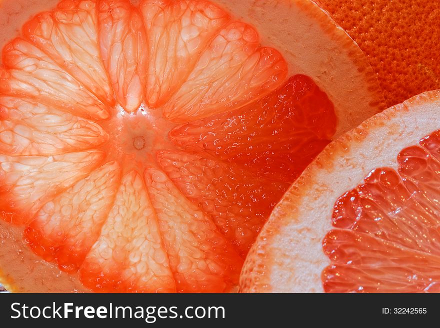 Glass of grapefruit juice with a slice of grapefruit