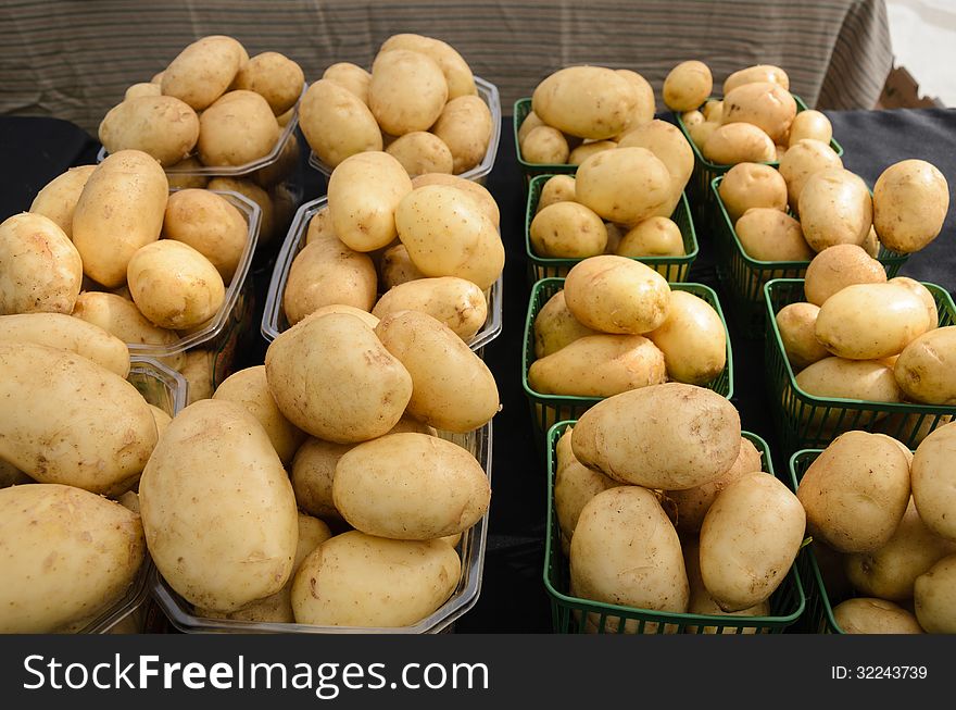 Organic Potatoes on display at outdoor Farmers Market. Organic Potatoes on display at outdoor Farmers Market