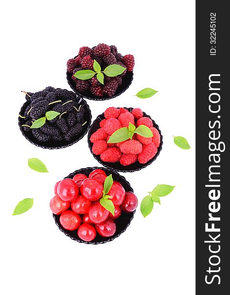Mulberry, cherry, raspberry, blackberry in a plates_5