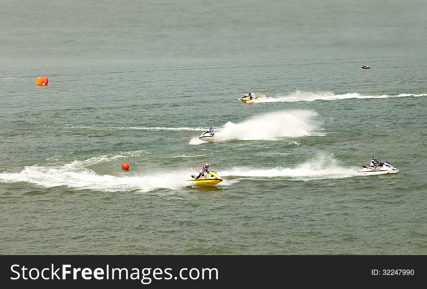 Jet-Ski race in the wide river