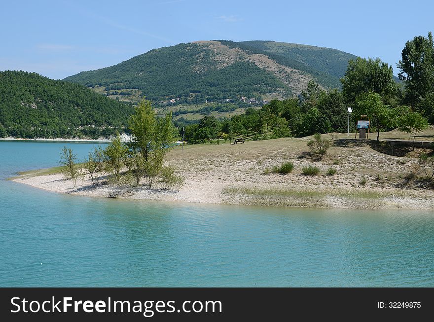 A view of clear mountain lake in the Marche region, Italy. A view of clear mountain lake in the Marche region, Italy.