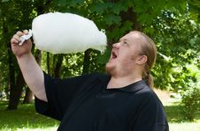 Man With Cotton Candy Royalty Free Stock Images