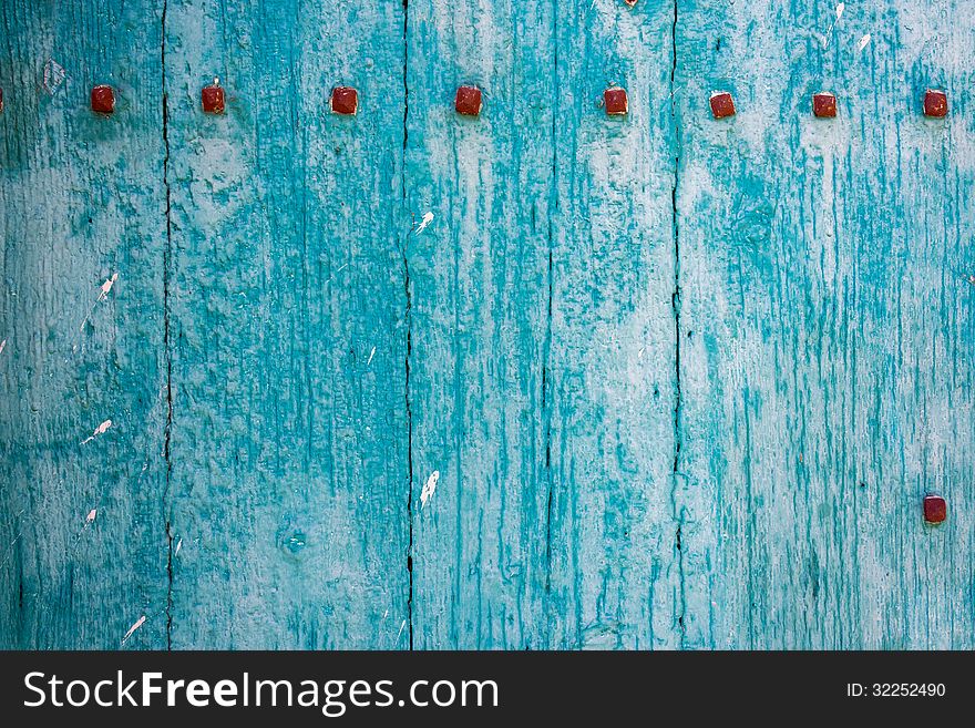 Blue wood abstract background from a door in Southern Italy