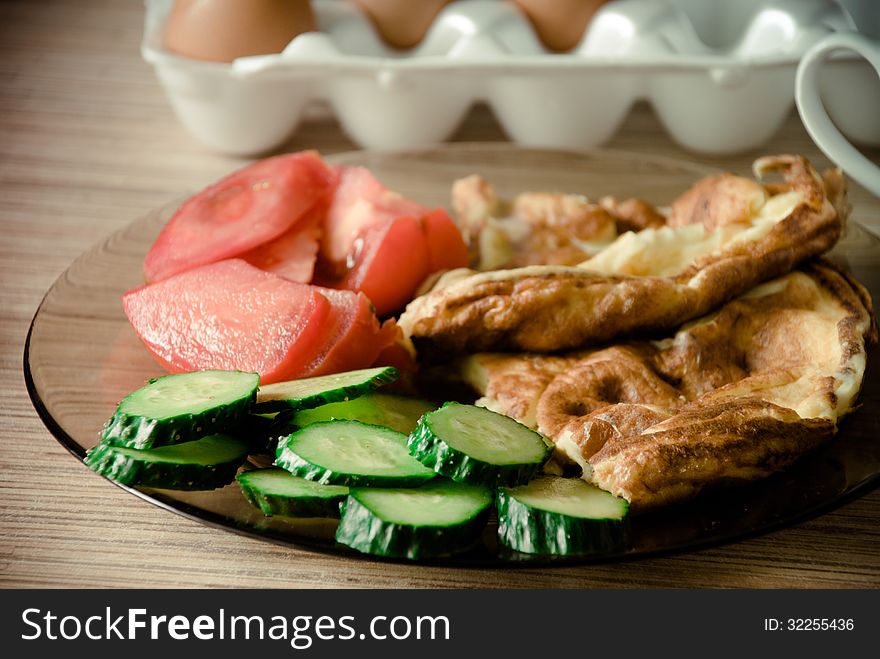 Tomelette with cucumbers and tomatoes for breakfast. Tomelette with cucumbers and tomatoes for breakfast