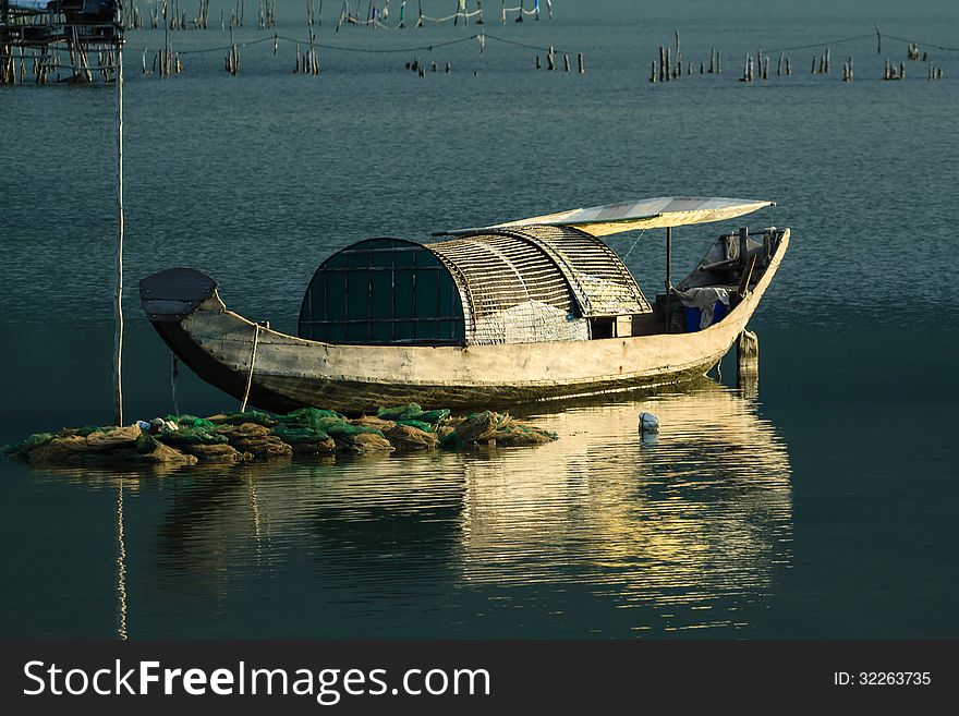 Boat on the Lap An pond, Lang co town, Hue, Vietnam. Boat on the Lap An pond, Lang co town, Hue, Vietnam