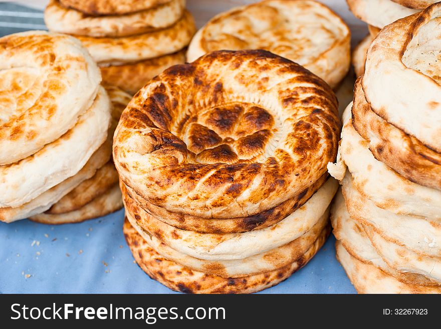 Traditional asian bread for sale at bakery in market place