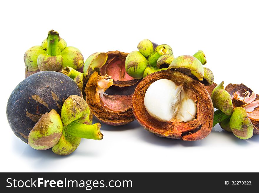 Mangosteen and segment with clipping path on white