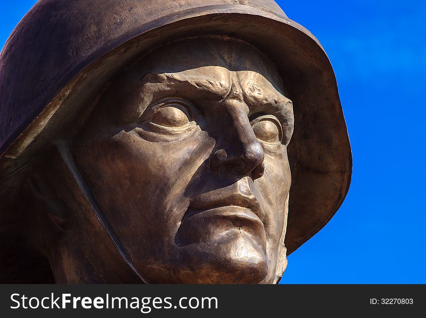 Face of a russian soldier made ​​of bronze. Face of a russian soldier made ​​of bronze