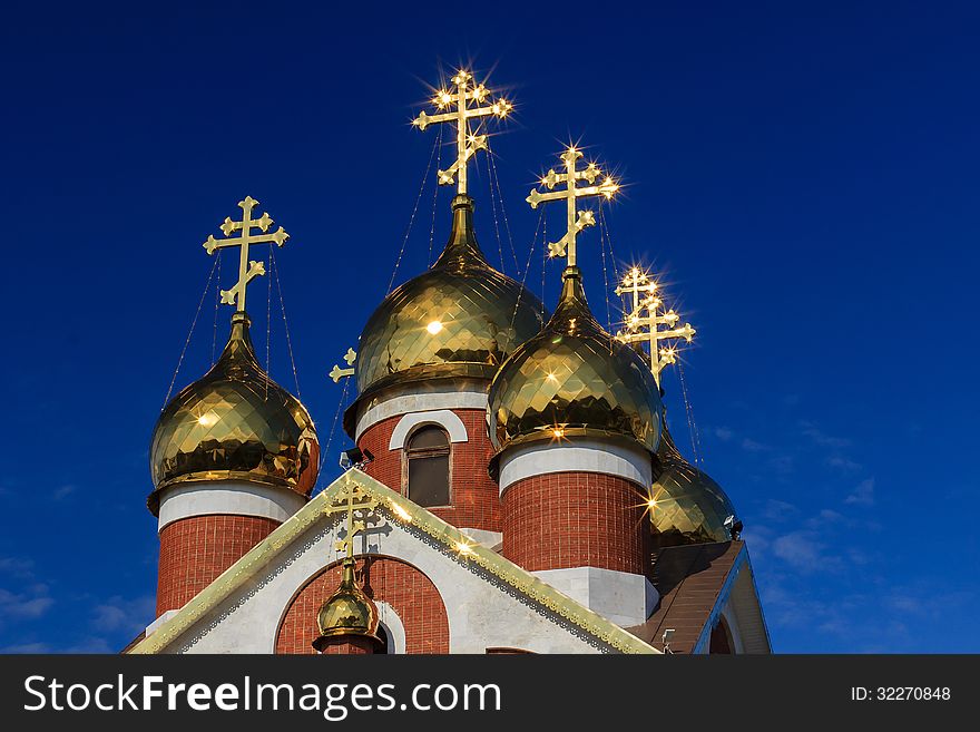 Orthodox church glossy crosses against the blue sky. Orthodox church glossy crosses against the blue sky
