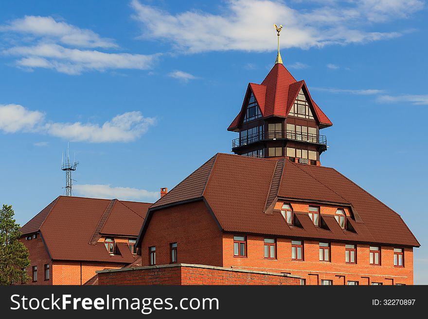 Fire station, red high tower with a on the top. Fire station, red high tower with a on the top