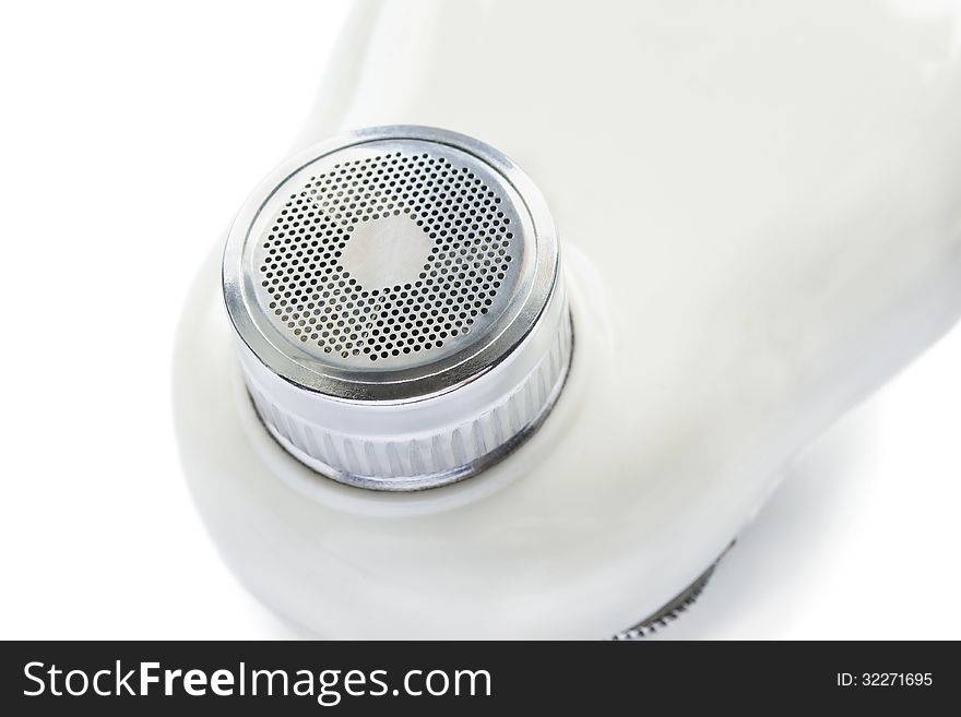 Vintage electrical shaver on white background closeup