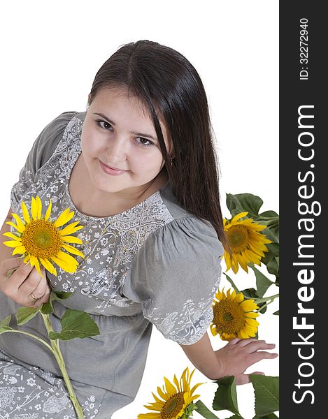 Portrait Of A Beautiful Girl With Sunflowers