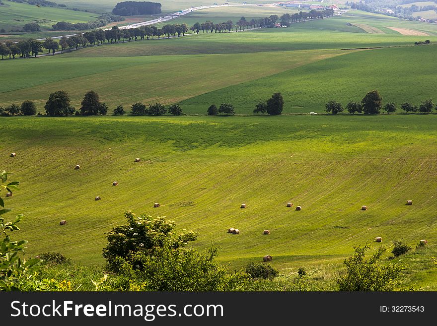 Making hay, and beautiful landscape