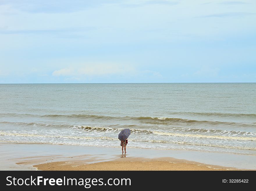 Girl On Beach With Umbella