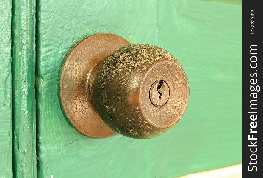 Vintage door knob on old wooden door