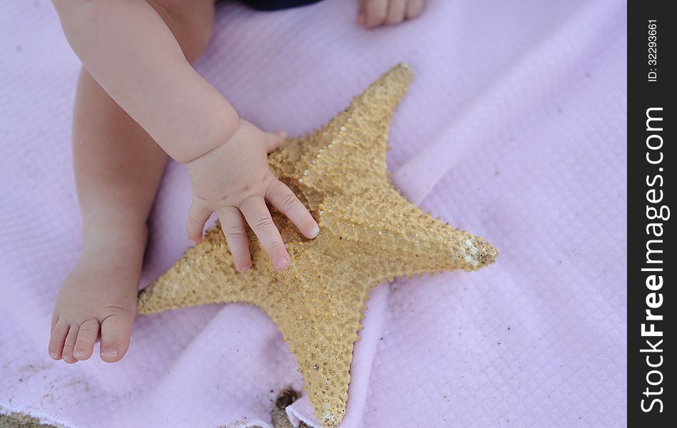 Little baby foot and handle holds great starfish