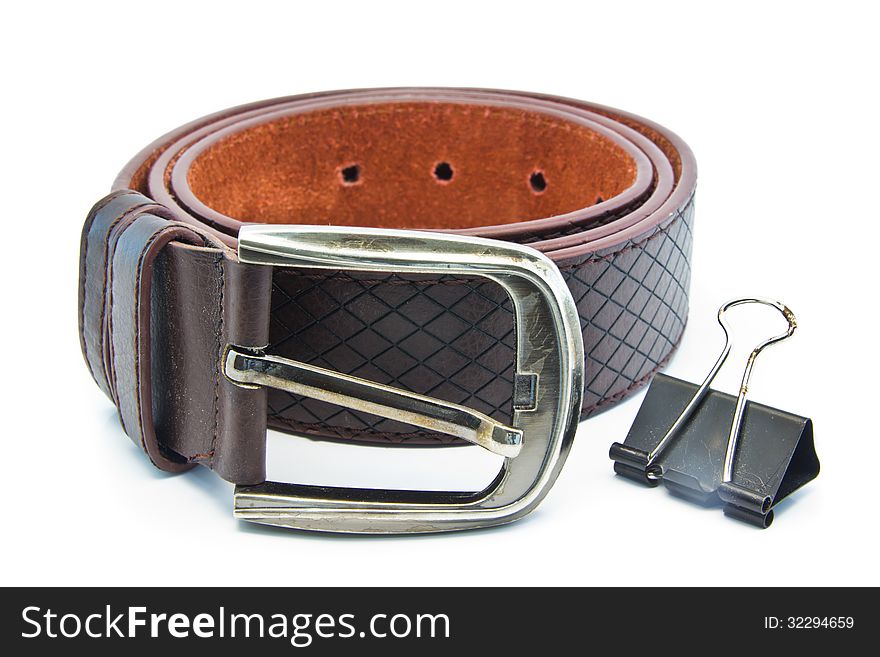 Isolated leather belt and clamp for men on white background. Isolated leather belt and clamp for men on white background.