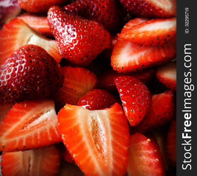 Close up with delicious cut strawberries