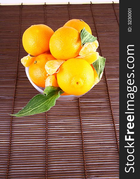 Fresh tangerine and orange isolated on white background