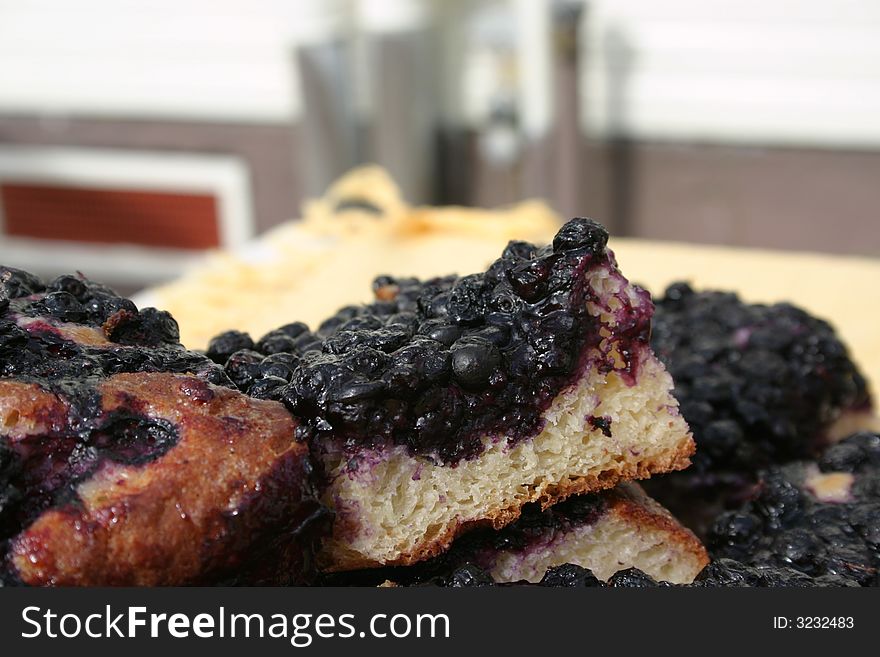 Black currant pie cut in pieces