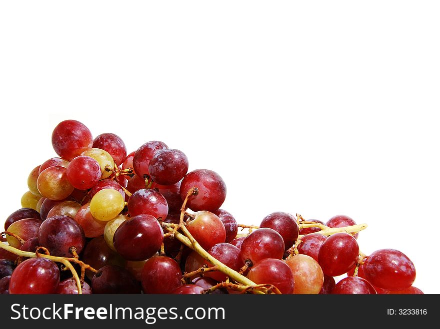 Juicy red grapes isolated on white background - perfect background image. Juicy red grapes isolated on white background - perfect background image
