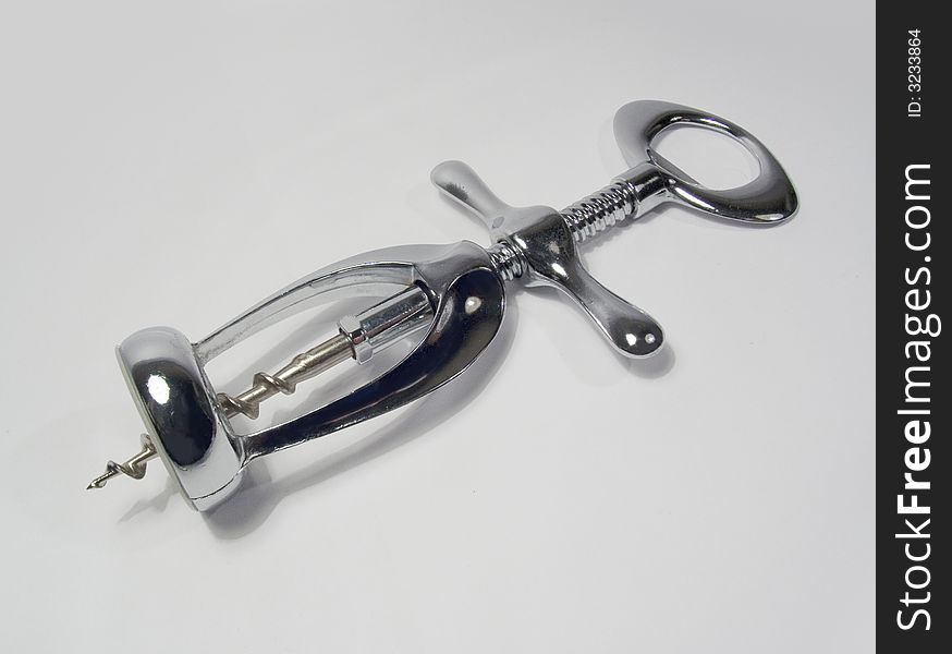 Chromeplated corkscrew for opening bottles with wine