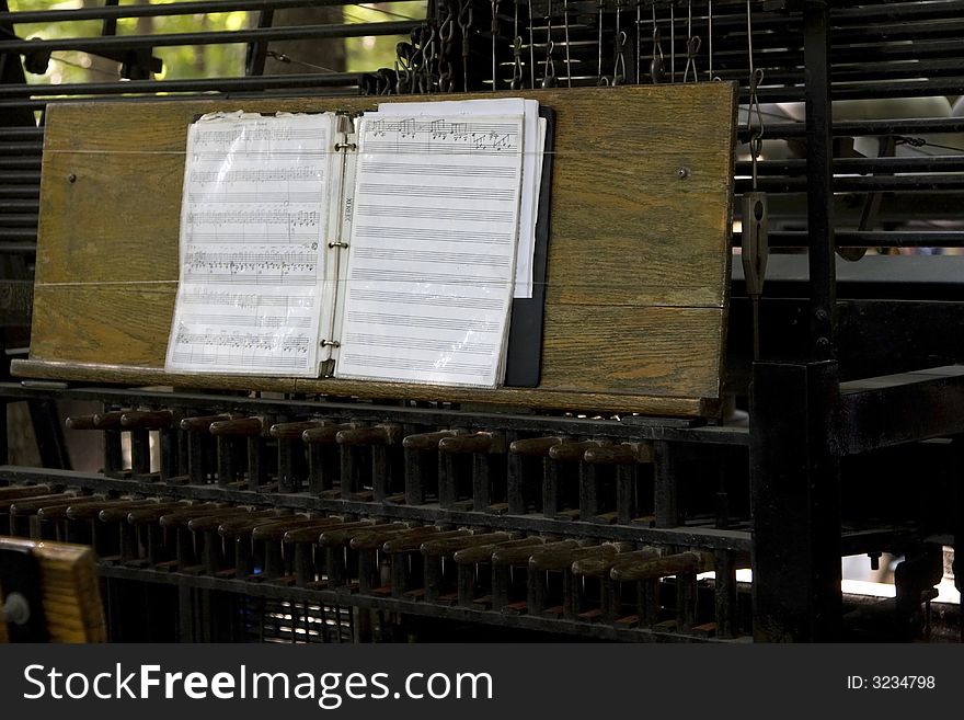 Book of music sitting on a stand. Book of music sitting on a stand