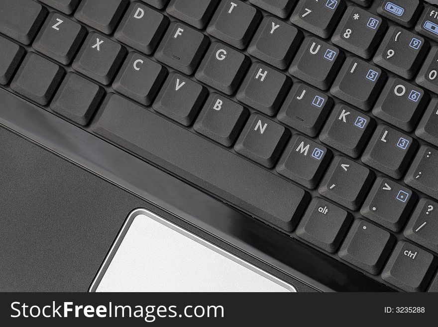 Keys Of A Black Laptop Keyboard, Silver Mouse Pad, Technology Background