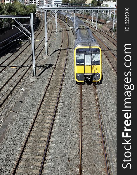 Straight Railway Tracks With Approaching Train, Public Transportation