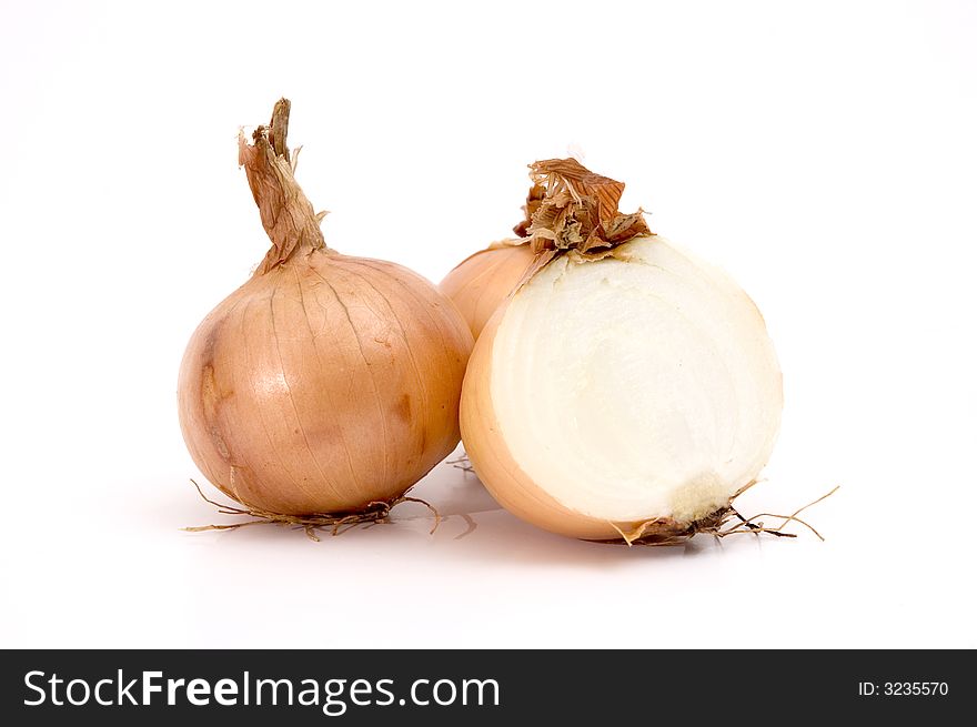 Group of white onions isolated over white